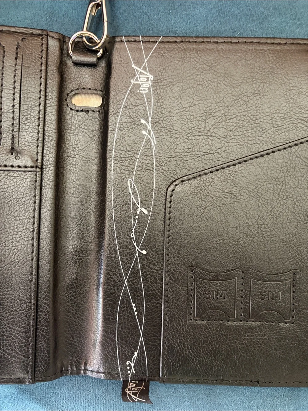 TNT RAyan Black Embossed Leather Passport Wallet with Signature Logo - Picture 7 of 10